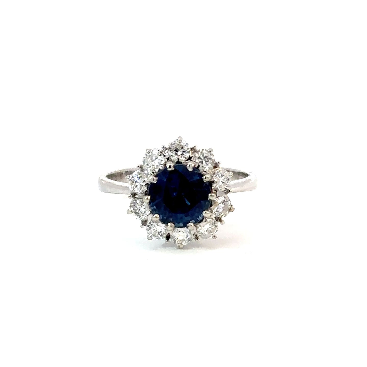 Sapphire and Diamond Halo Ring in 18K White Gold