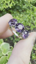 Load and play video in Gallery viewer, VINTAGE AMETHYST TRILOGY RING IN PLATINUM
