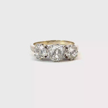 Load and play video in Gallery viewer, STUNNING OLD CUT DIAMOND TRILOGY RING IN 18KT WHITE GOLD
