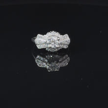 Load and play video in Gallery viewer, VINTAGE BOW TIE DIAMOND RING IN 14KT WHITE GOLD
