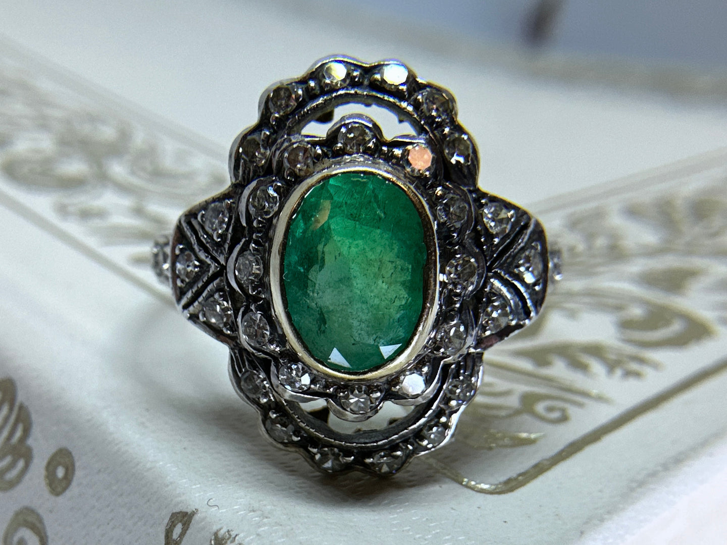 ANTIQUE STYLE EMERALD AND DIAMOND RING